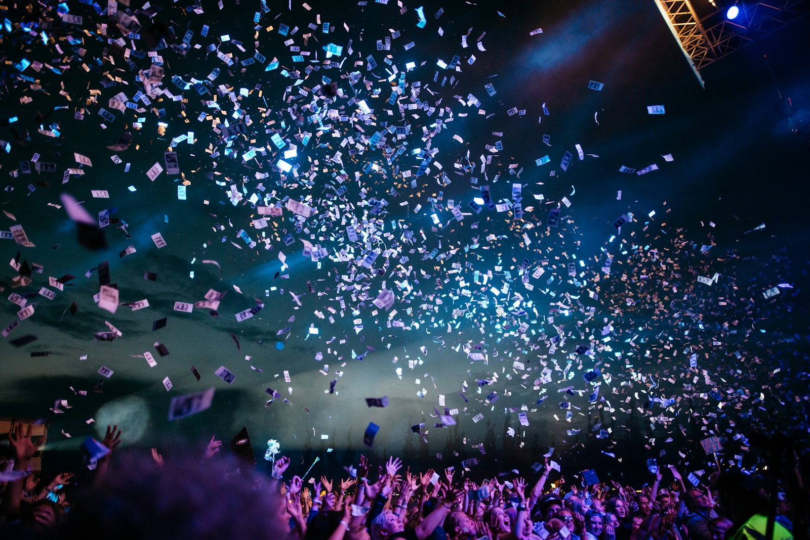 Confetti filling a live event space with colour and energy